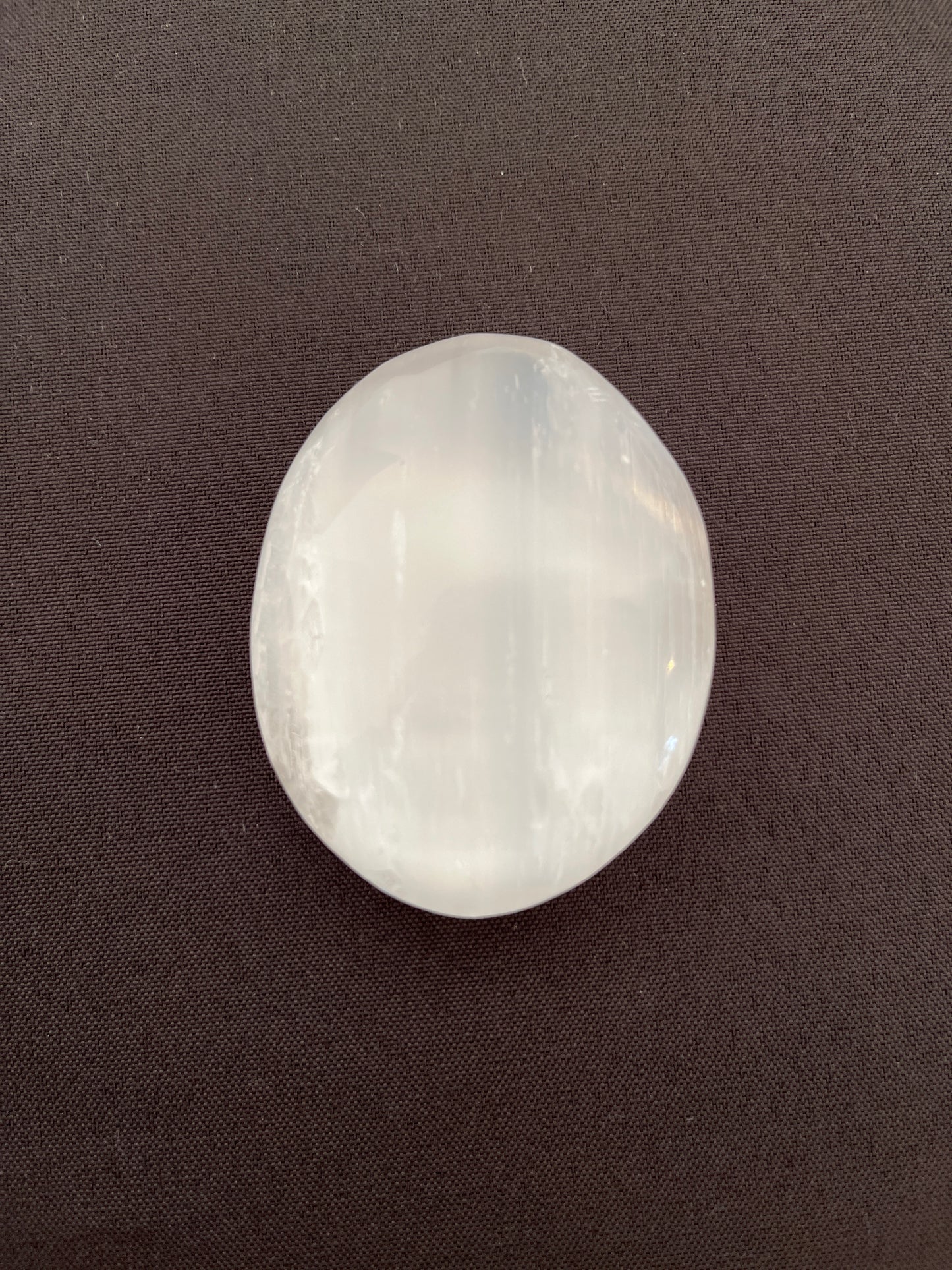 Selenite Puffy Palm Stone EC25002